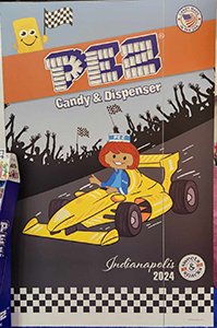 Sweets and Snacks Expo PEZ Booth Indy Car with Pez Presenter Girl