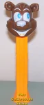 (image for) Misfit Icee Bear Pez Brown Face on Orange Stem Gold Tongue