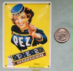 Pez Girl with Regular and Peppermint Pez Candy Pack 3" x 4" Tin Postcard Sign (image for) Pez Girl with Regular and Peppermint Pez Candy Pack 3" x 4" Tin Postcard Sign