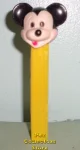 (image for) Mickey Molded Poke Thru Nose Pez Yellow 3.9 NF Hong Kong Stem